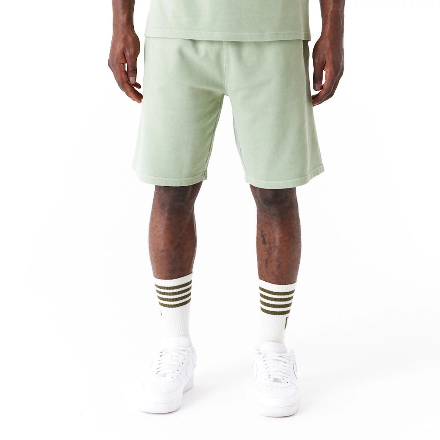 The Male model is wearing New Era Washed Green Shorts 1