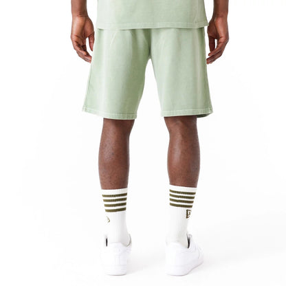 The Male model is wearing New Era Washed Green Shorts 5