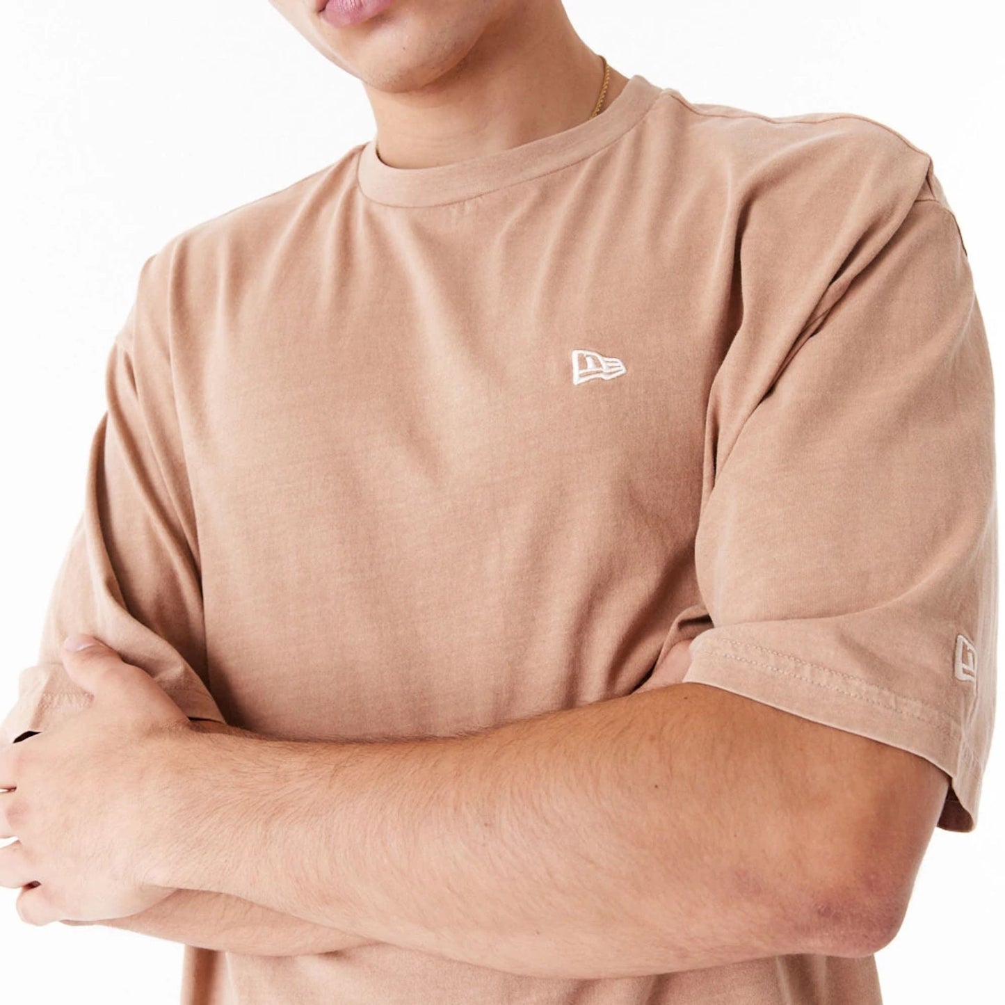 The Male model is wearing New Era Washed Orange Oversized T-Shirt 4