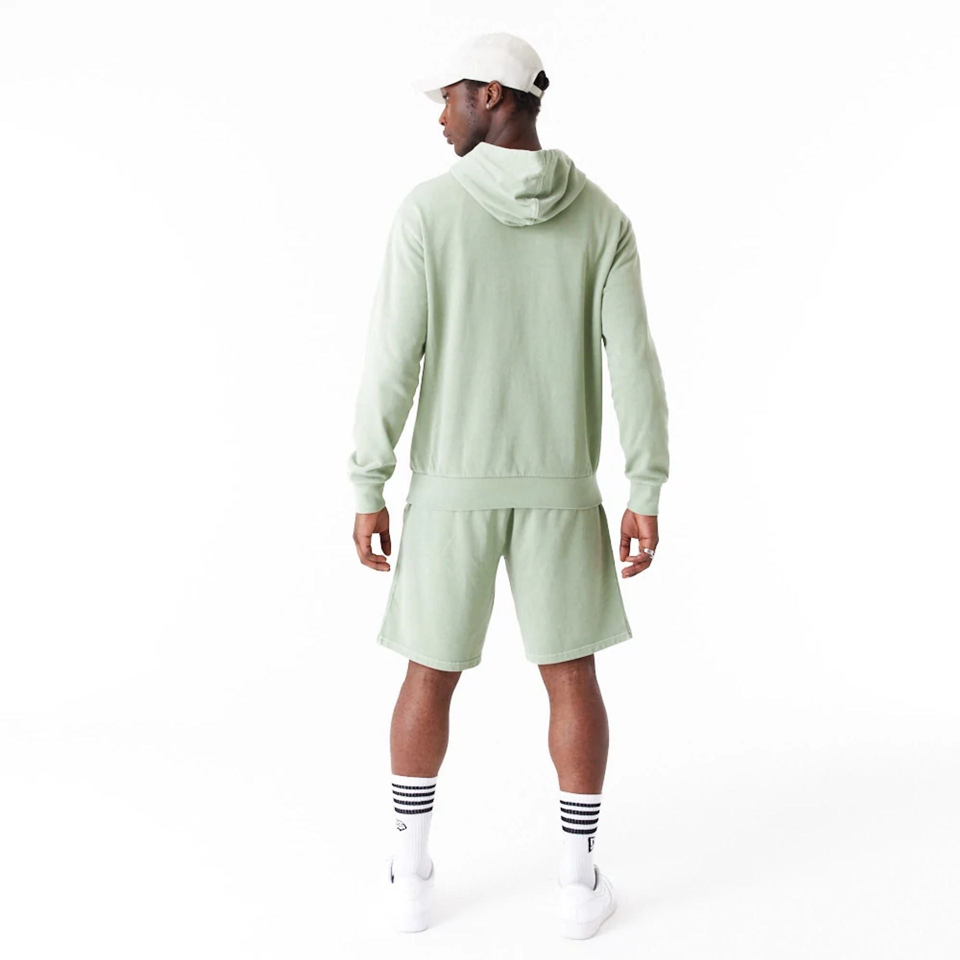 The Male model is wearing New Era Washed Green Oversized Pullover Hoodie 2