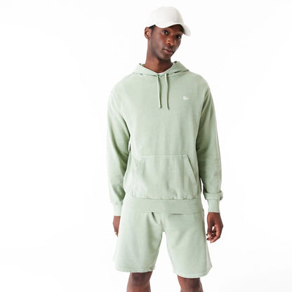 The Male model is wearing New Era Washed Green Oversized Pullover Hoodie 11