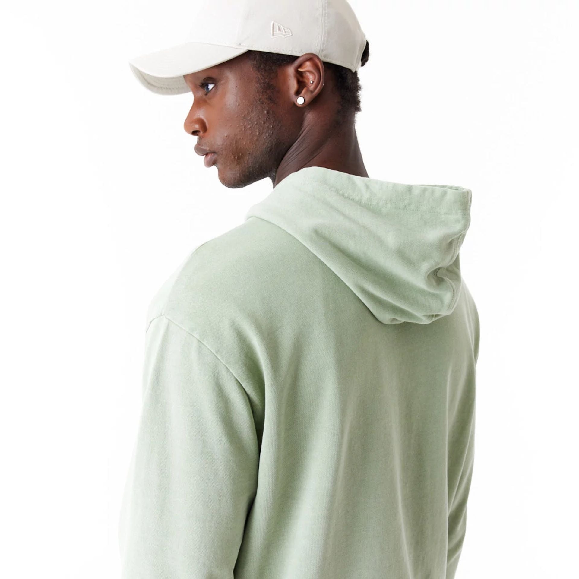 The Male model is wearing New Era Washed Green Oversized Pullover Hoodie 6