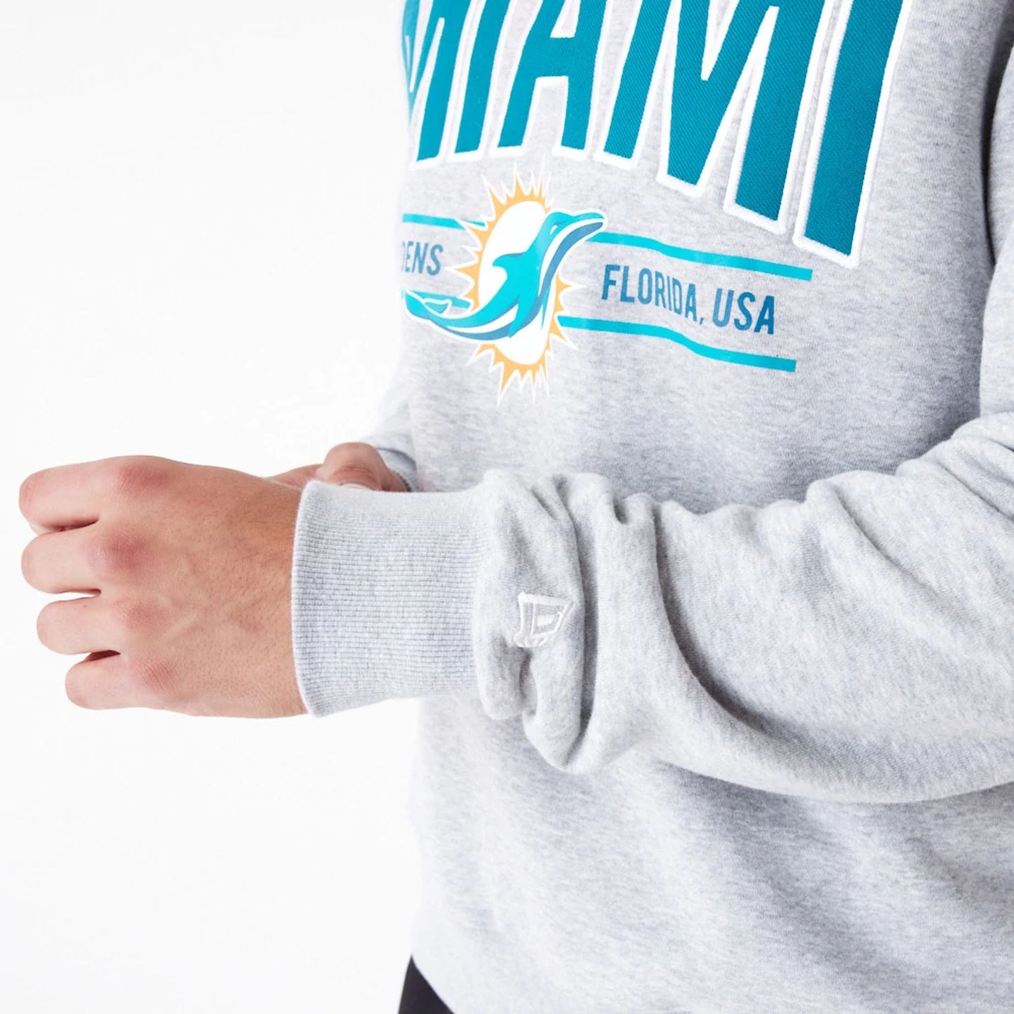 The Male model is wearing Miami Dolphins NFL Wordmark Grey Oversized Crew Neck Sweatshirt 2