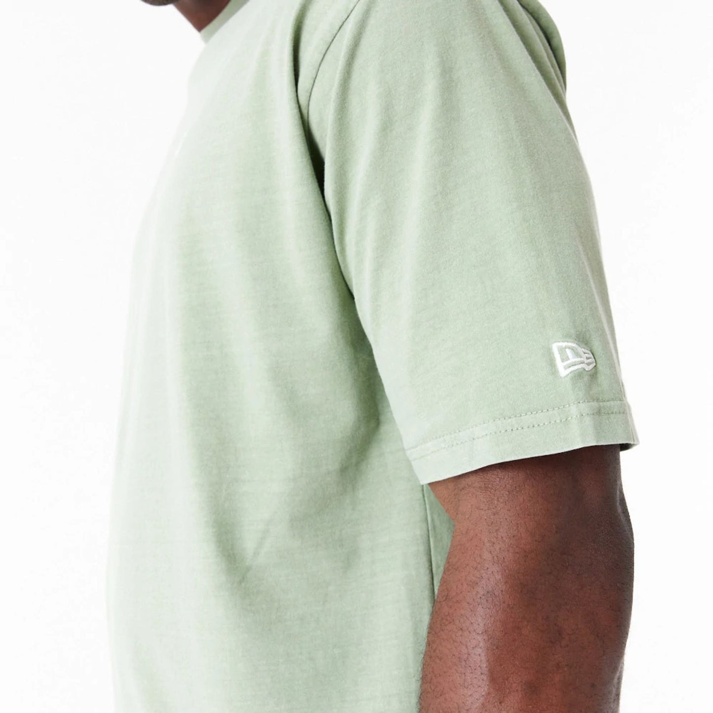 The Male model is wearing New Era Washed Green Oversized T-Shirt 4