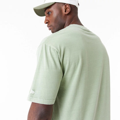 The Male model is wearing New Era Washed Green Oversized T-Shirt 2