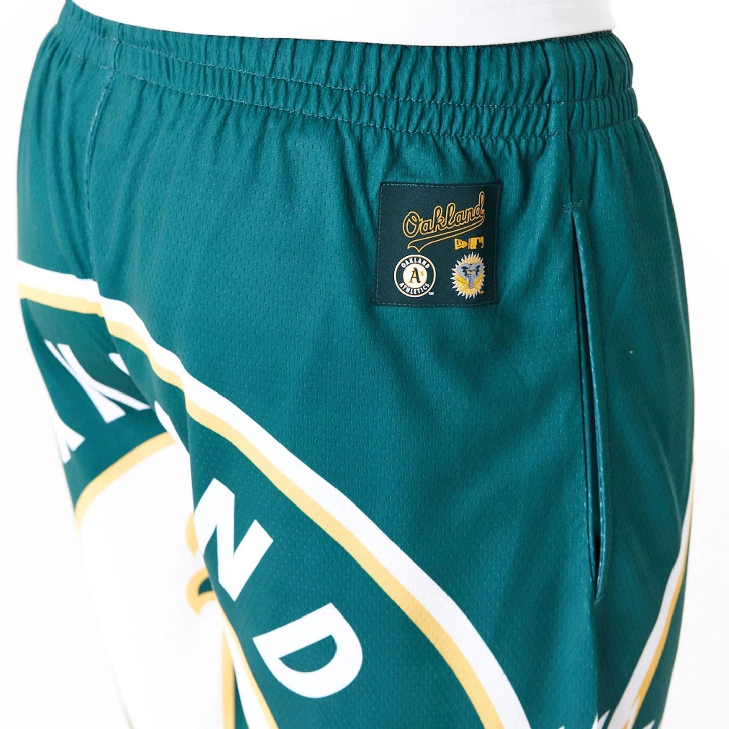 The Male model is wearing Oakland Athletics MLB Large Logo Dark Green Shorts 5