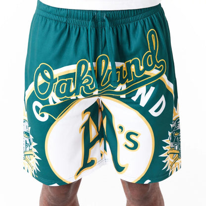 The Male model is wearing Oakland Athletics MLB Large Logo Dark Green Shorts 6