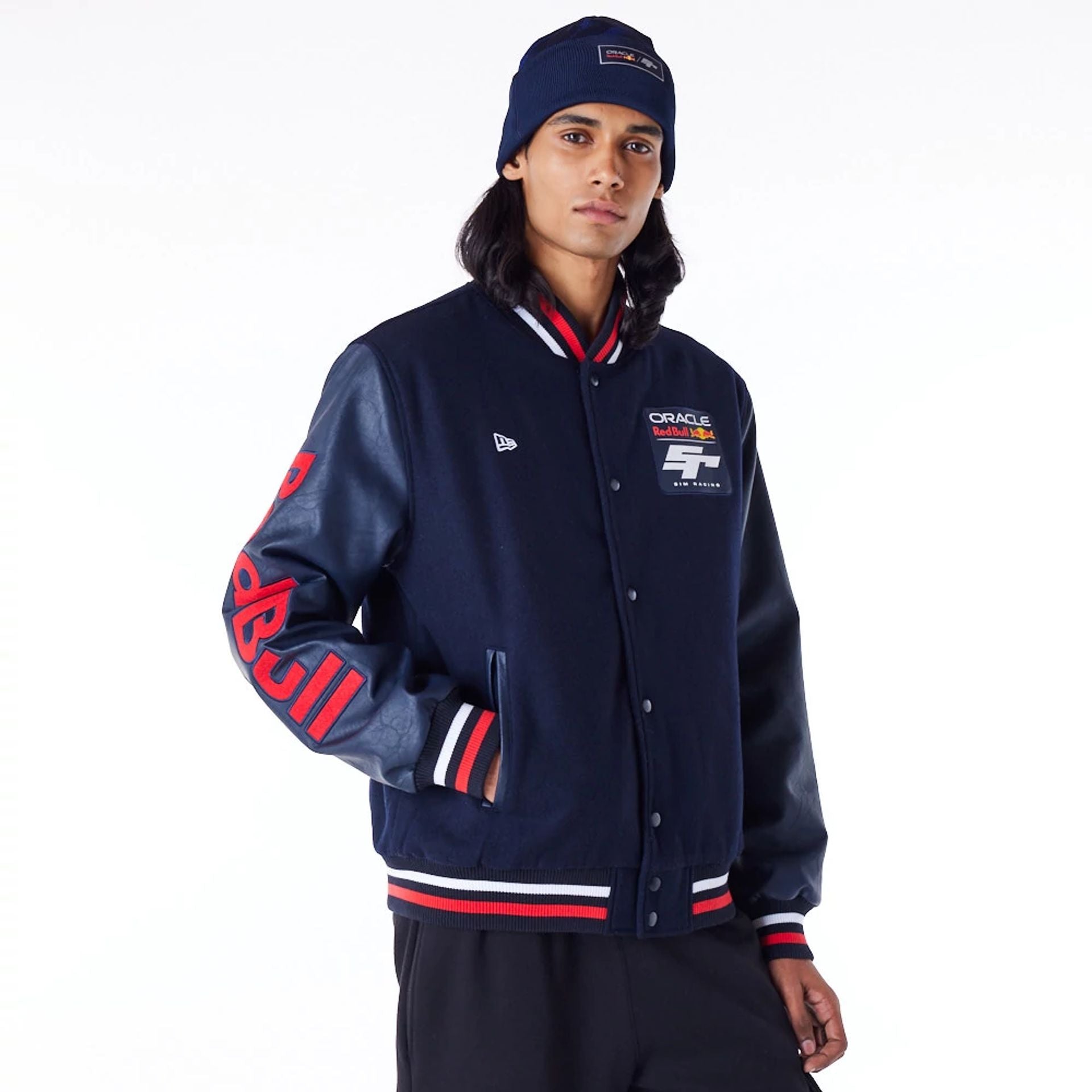 The Male model is wearing Red Bull Sim Racing Navy Varsity Jacket 1