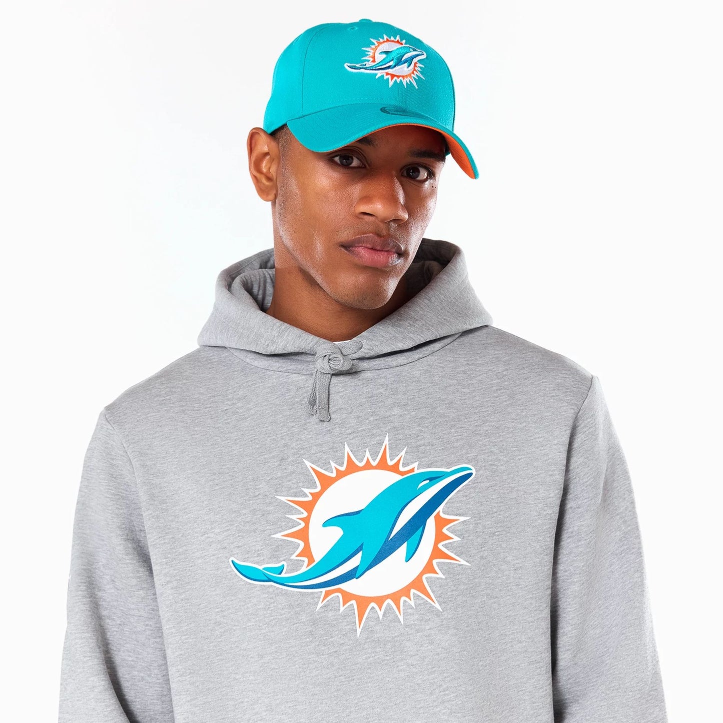 The Male model is wearing Miami Dolphins NFL Grey Pullover Hoodie 3