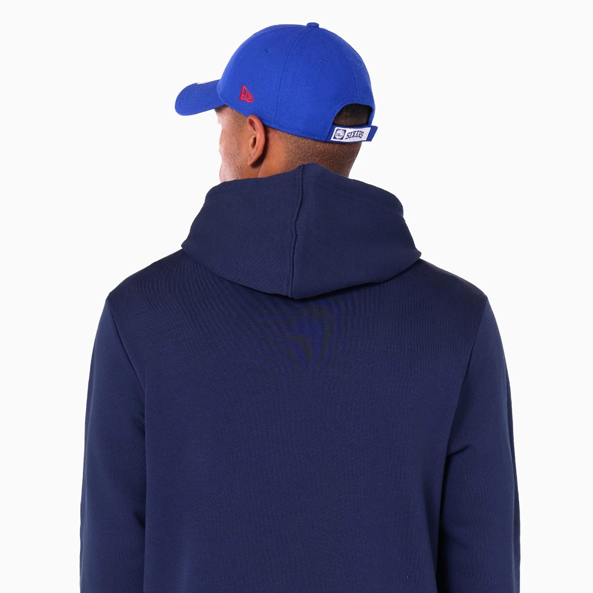 The Male model is wearing Philadelphia 76ers NBA Navy Pullover Hoodie 3