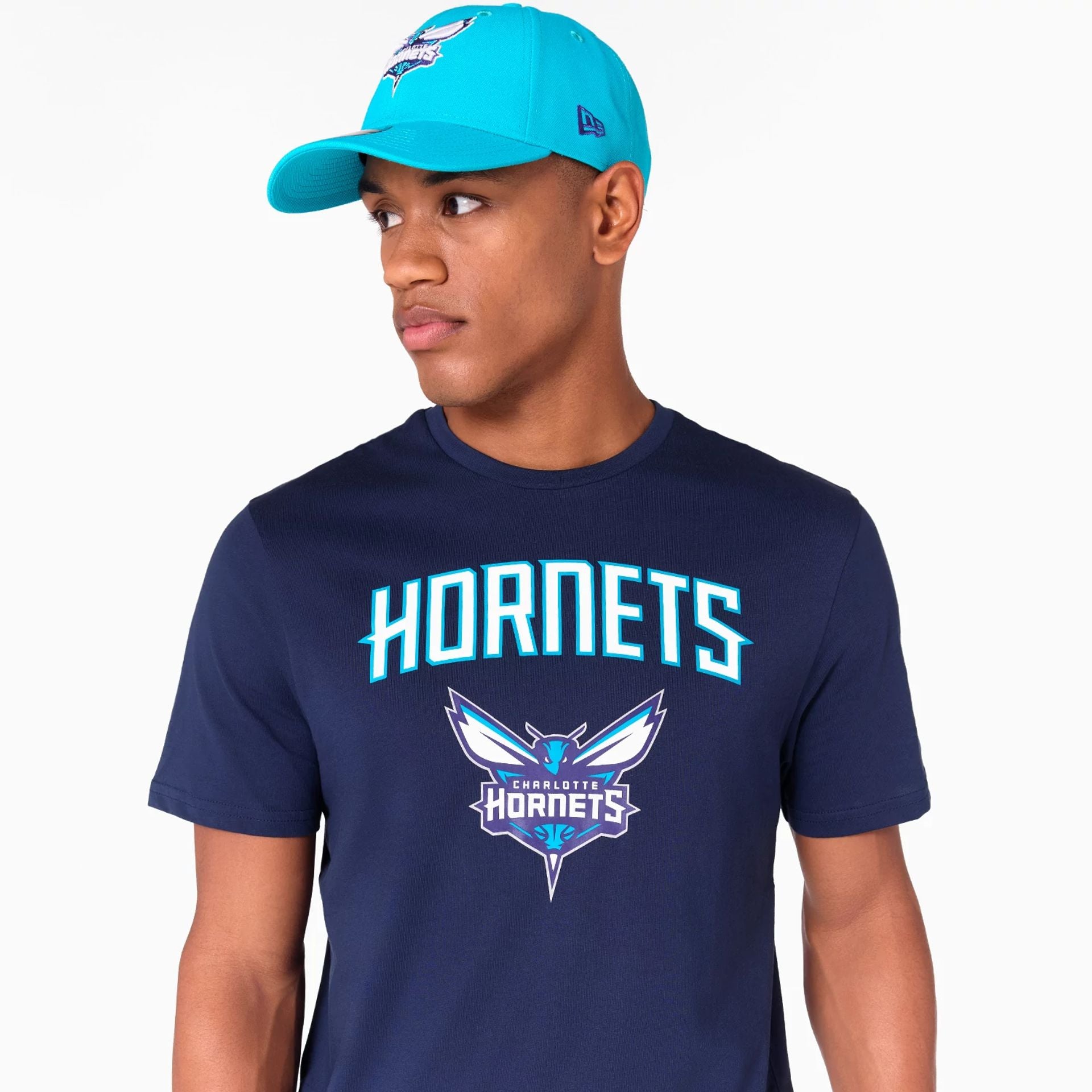 The Male model is wearing Charlotte Hornets NBA Navy T-Shirt 5