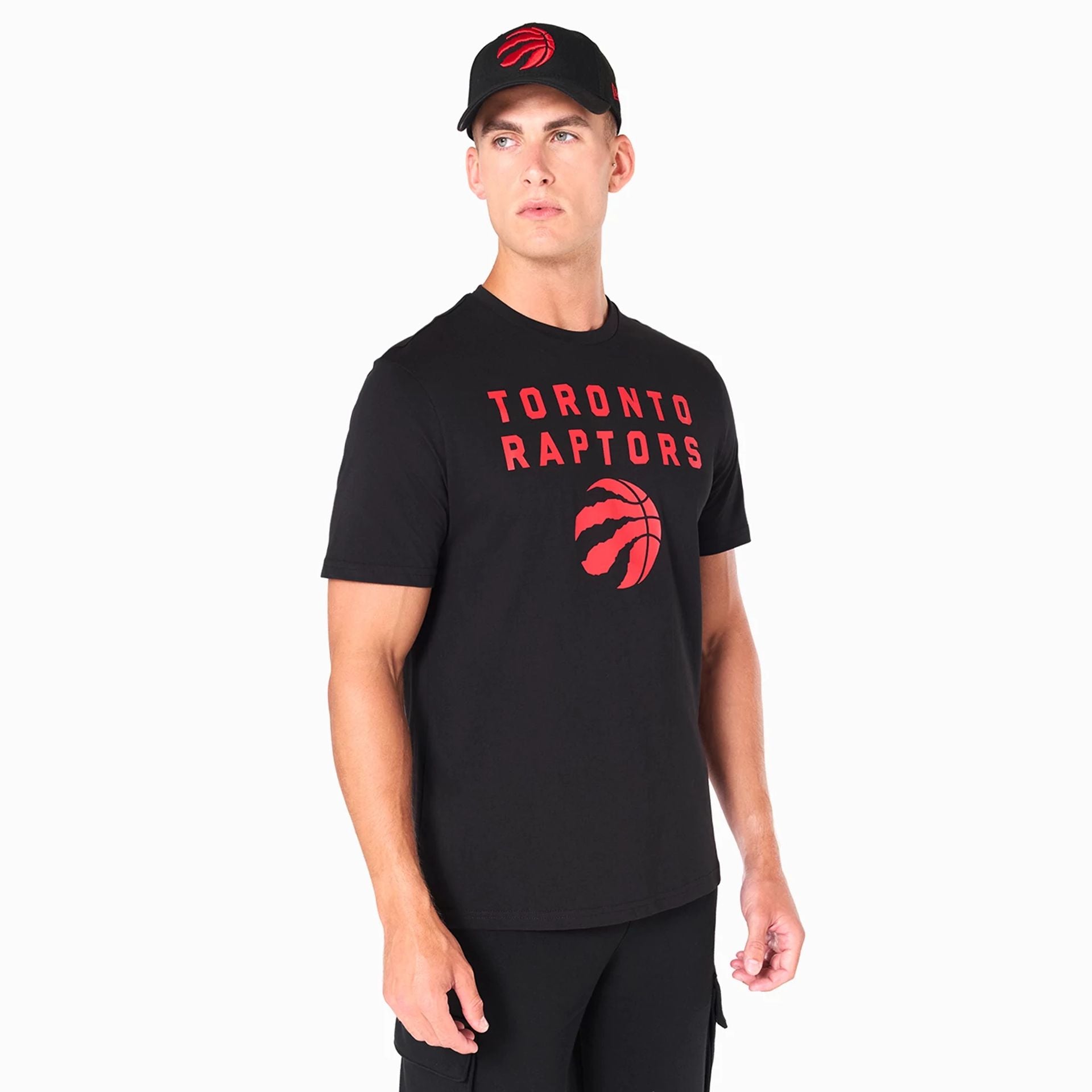 The Male model is wearing Toronto Raptors NBA Black T-Shirt 1