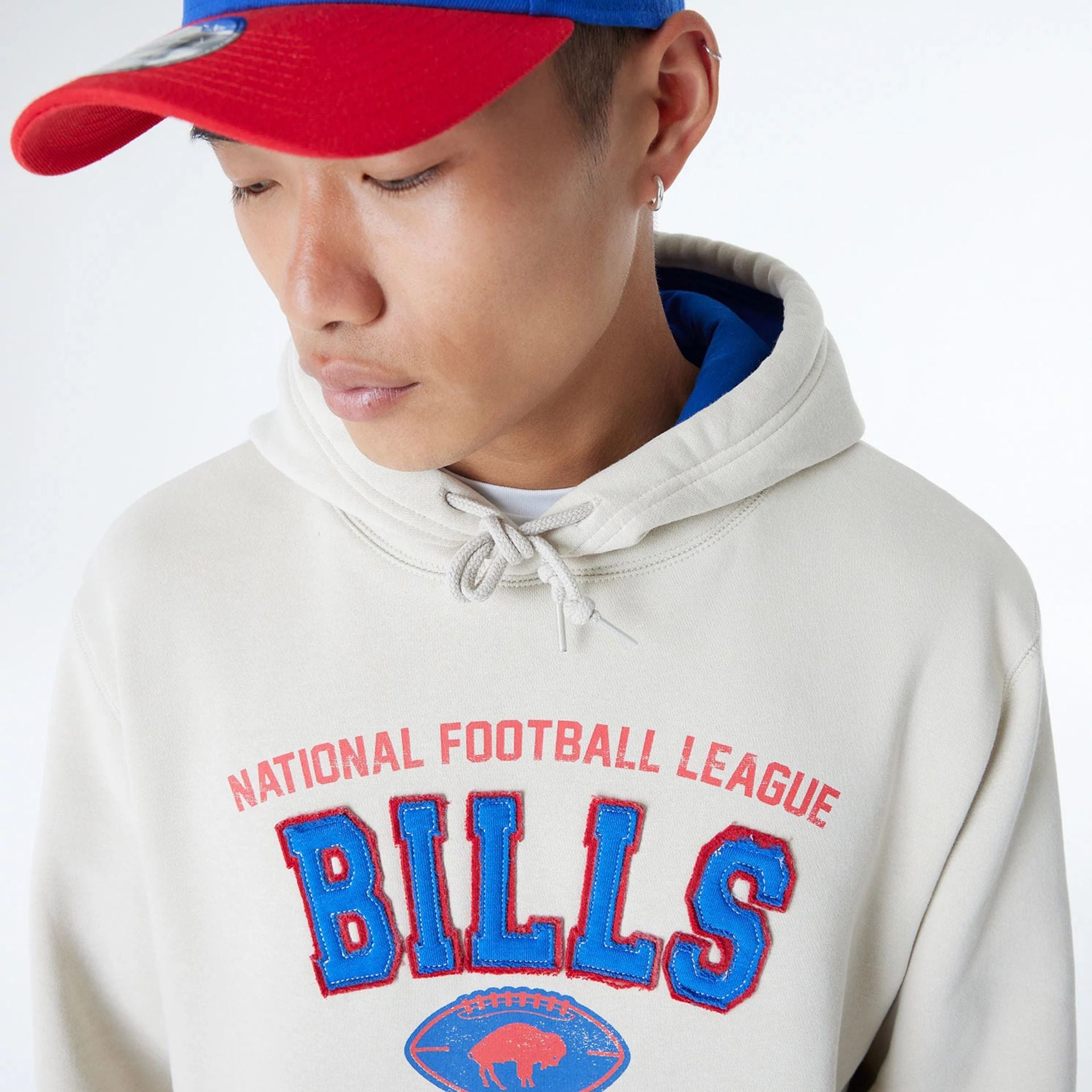 The Male model is wearing Buffalo Bills NFL 3rd Down Historic Light Beige Pullover Hoodie  2