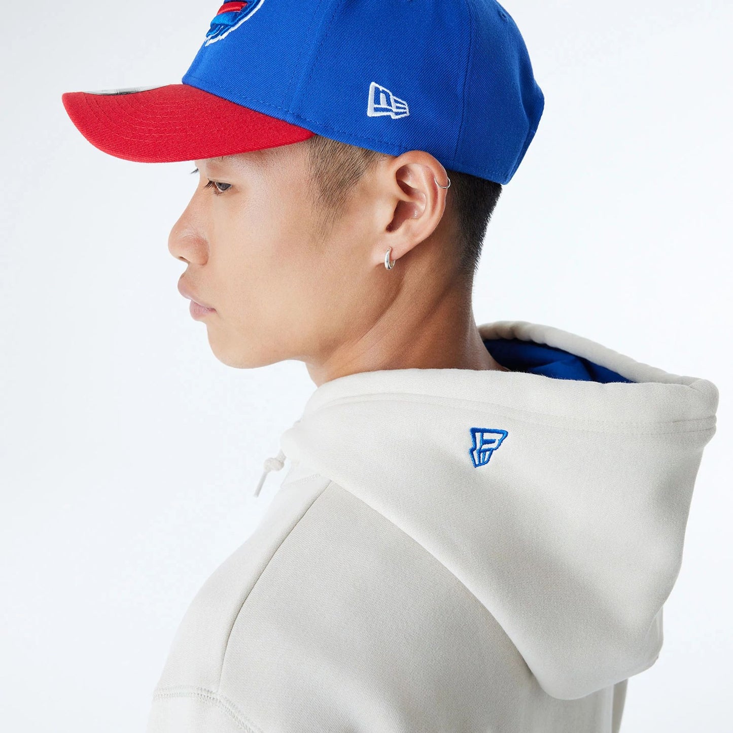 The Male model is wearing Buffalo Bills NFL 3rd Down Historic Light Beige Pullover Hoodie  4