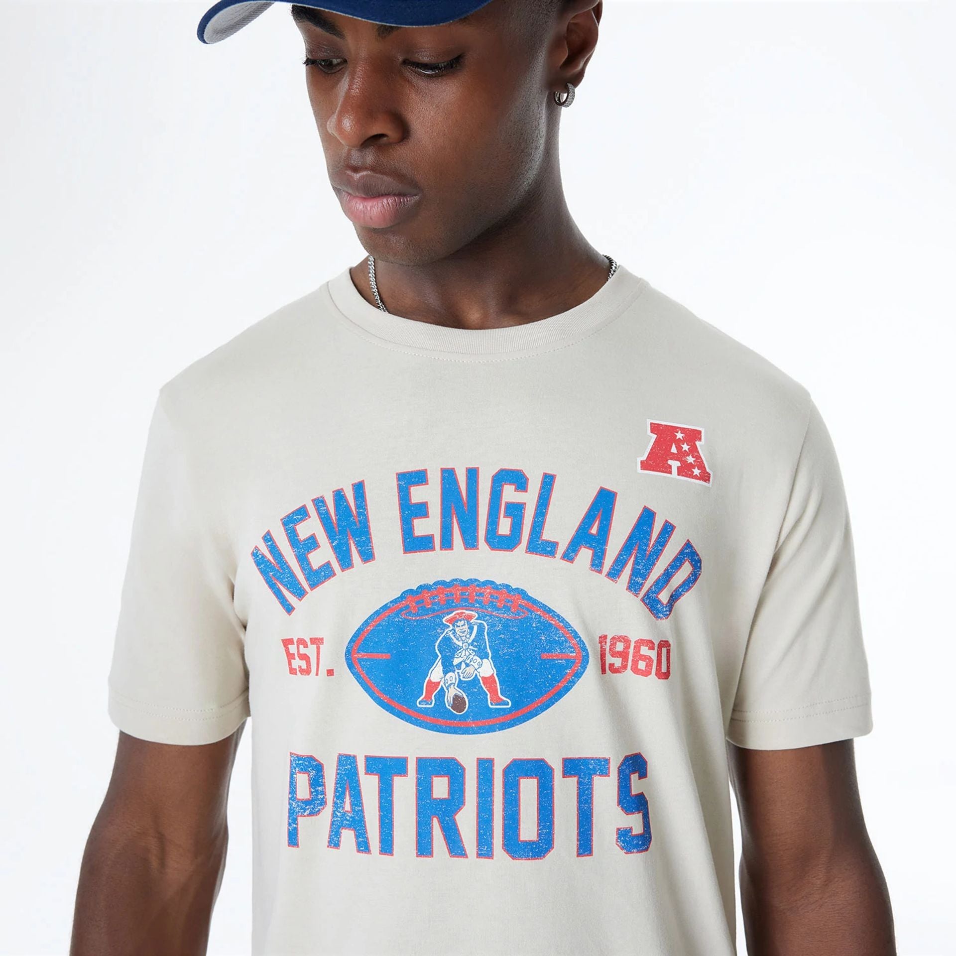 The Male model is wearing New England Patriots NFL 3rd Down Historic Light Beige T-Shirt  3