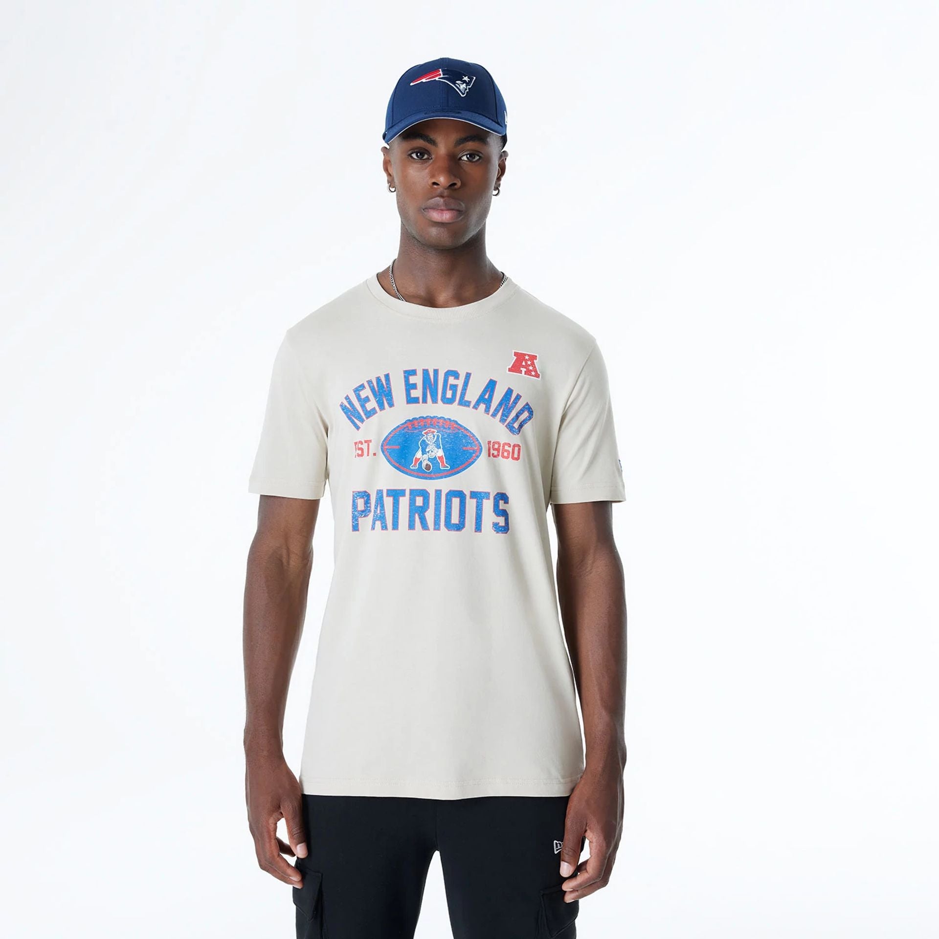 The Male model is wearing New England Patriots NFL 3rd Down Historic Light Beige T-Shirt  1