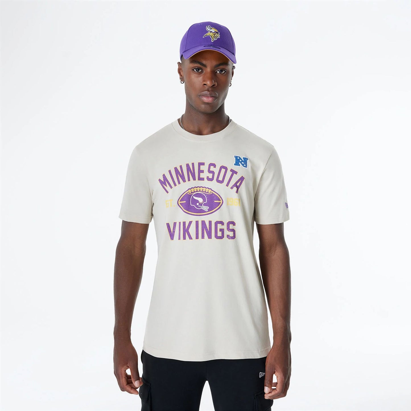 The Male model is wearing Minnesota Vikings NFL 3rd Down Historic Light Beige T-Shirt  1