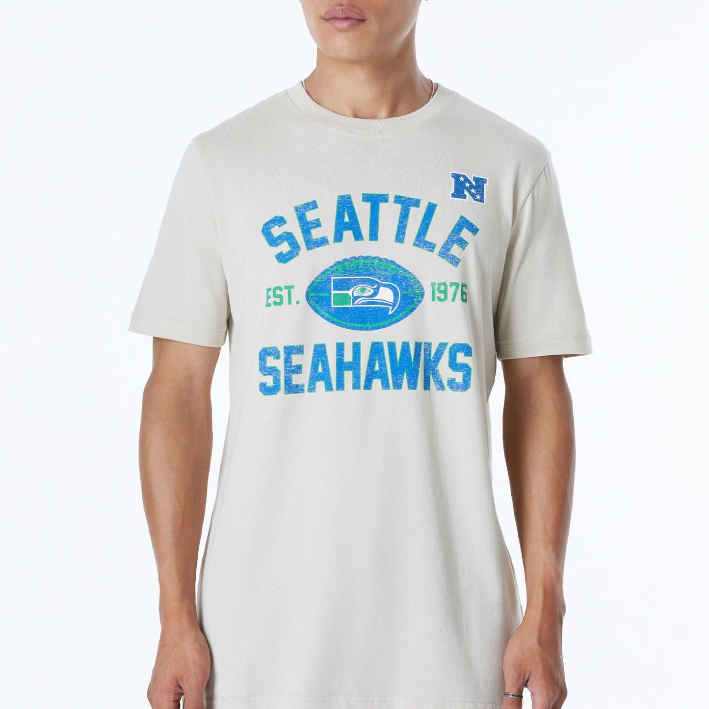 The Male model is wearing Seattle Seahawks NFL 3rd Down Historic Light Beige T-Shirt  3