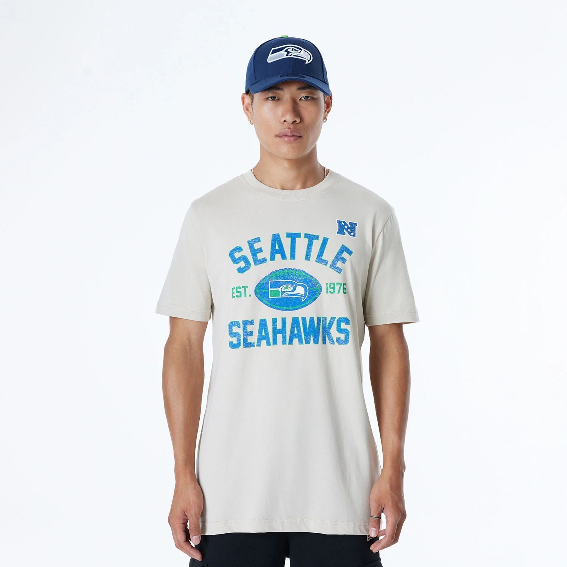 The Male model is wearing Seattle Seahawks NFL 3rd Down Historic Light Beige T-Shirt  1