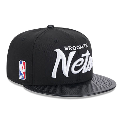 This is a Brooklyn Nets Faux Leather Visor Black 9FIFTY Snapback Cap 1