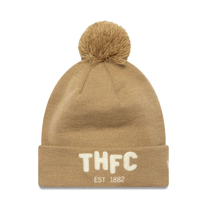 This is a Tottenham Hotspur FC Boucle Dark Beige Bobble Knit Beanie Hat 1