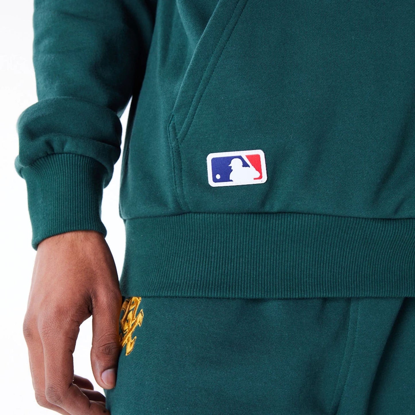 The Male model is wearing Chicago White Sox League Essential Dark Green Oversized Pullover Hoodie 6