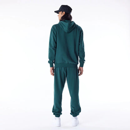 The Male model is wearing Chicago White Sox League Essential Dark Green Oversized Pullover Hoodie 9