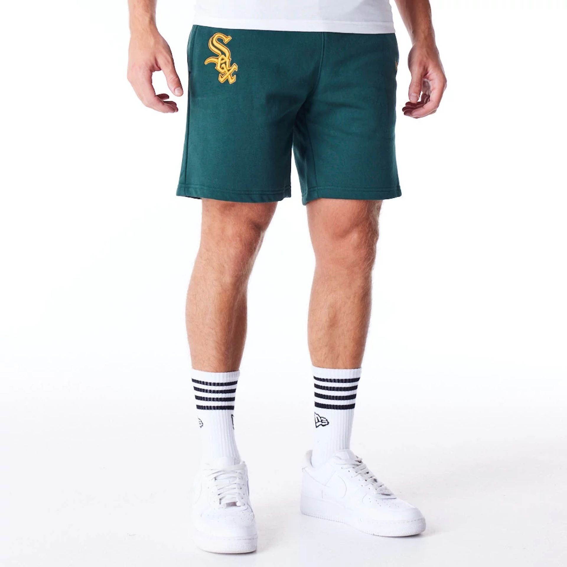 The Male model is wearing Chicago White Sox League Essential Dark Green Shorts 1