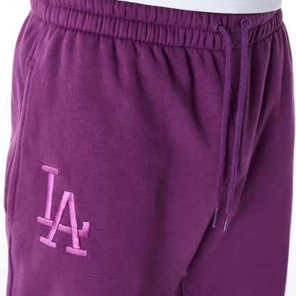 The Male model is wearing LA Dodgers League Essential Dark Purple Fleece Joggers 6