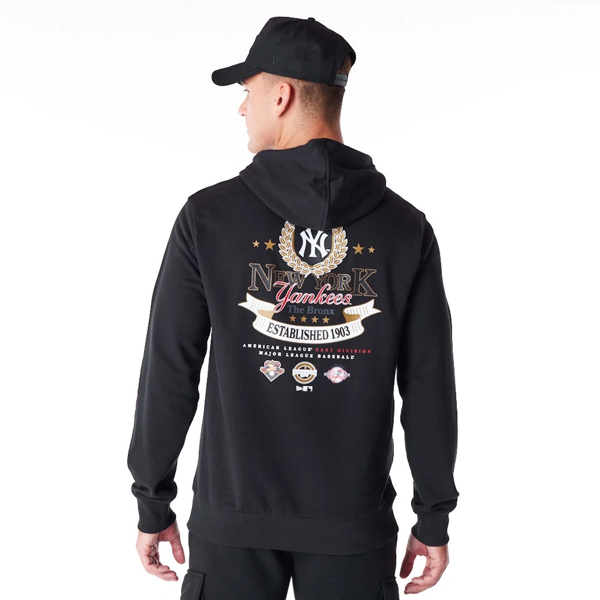 The Male model is wearing New York Yankees MLB Badge Graphic Black Pullover Hoodie 5