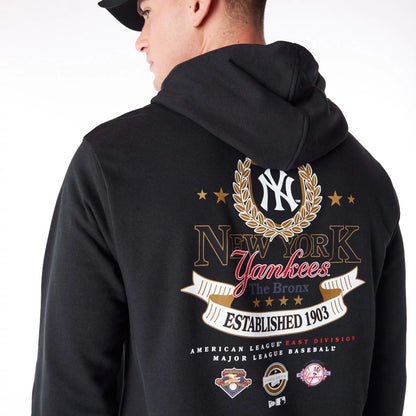 The Male model is wearing New York Yankees MLB Badge Graphic Black Pullover Hoodie 6