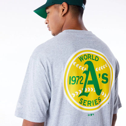 The Male model is wearing Oakland Athletics MLB World Series Grey Oversized T-Shirt  5