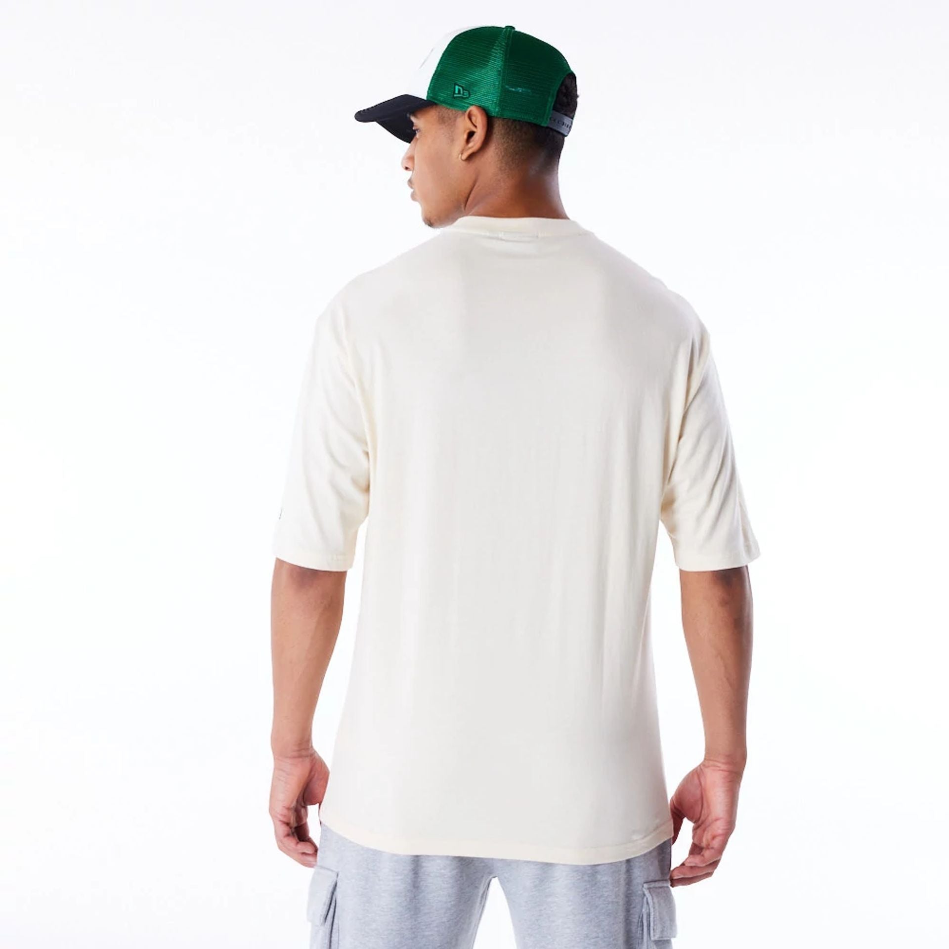 The Male model is wearing Boston Celtics NBA Script Stone Oversized T-Shirt 4