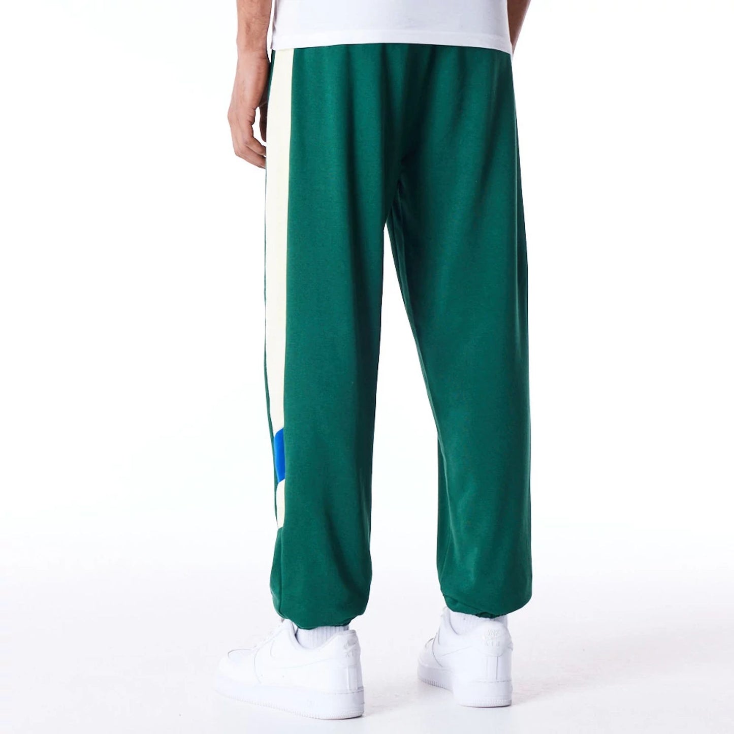 The Male model is wearing Milwaukee Bucks NBA Panel Dark Green Fleece Joggers 3