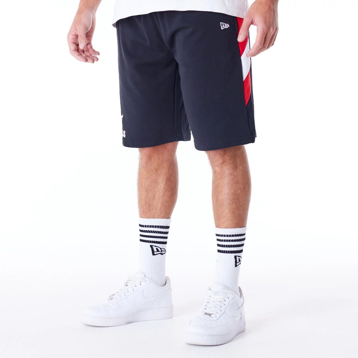 The Male model is wearing Chicago Bulls NBA Panel Black Oversized Shorts 6