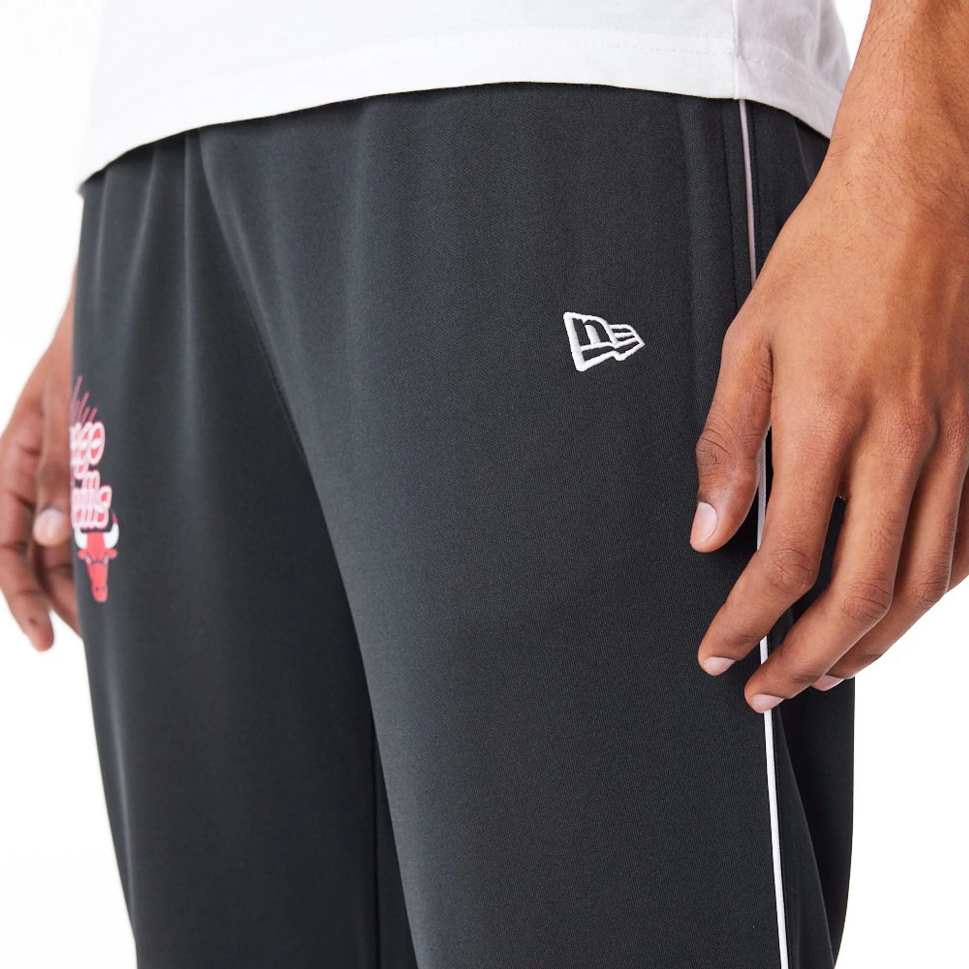 The Male model is wearing Chicago Bulls NBA Script Black Fleece Track Joggers 3