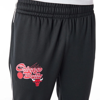 The Male model is wearing Chicago Bulls NBA Script Black Fleece Track Joggers 7