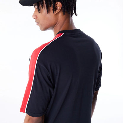 The Male model is wearing Chicago Bulls NBA Panel Black Oversized T-Shirt  5