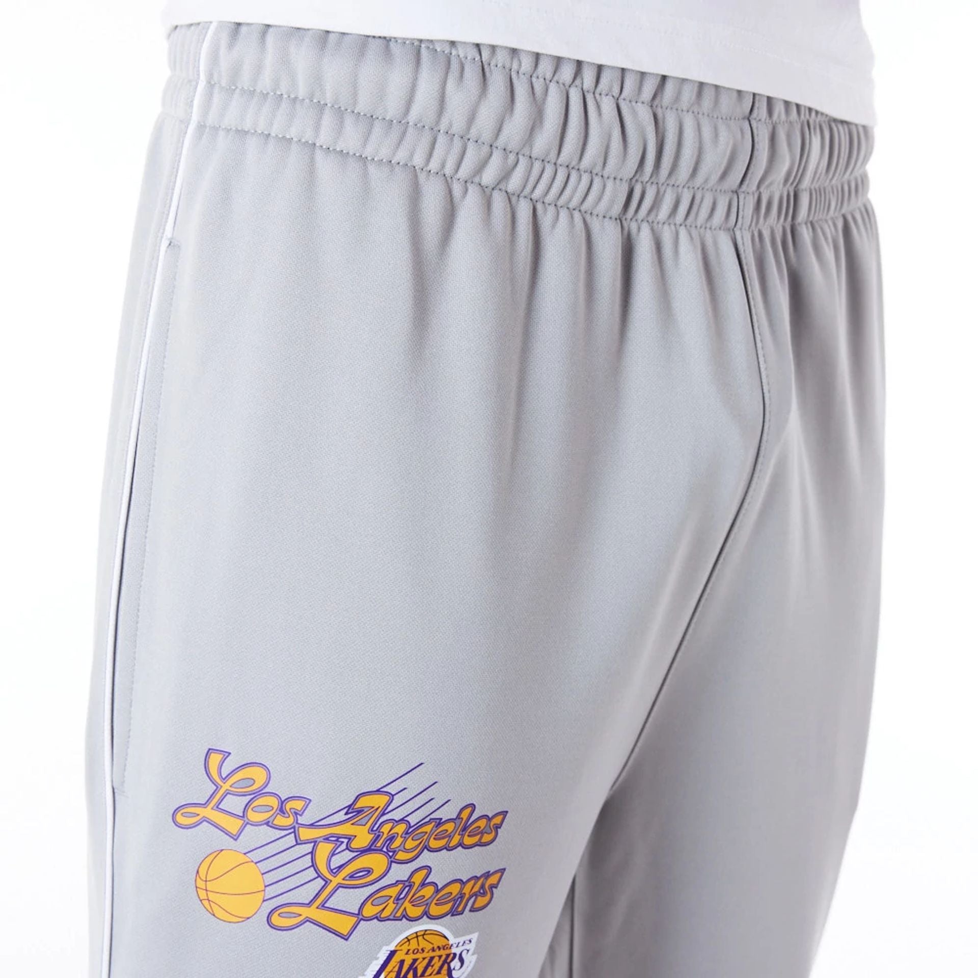 The Male model is wearing LA Lakers NBA Script Grey Fleece Track Joggers 4