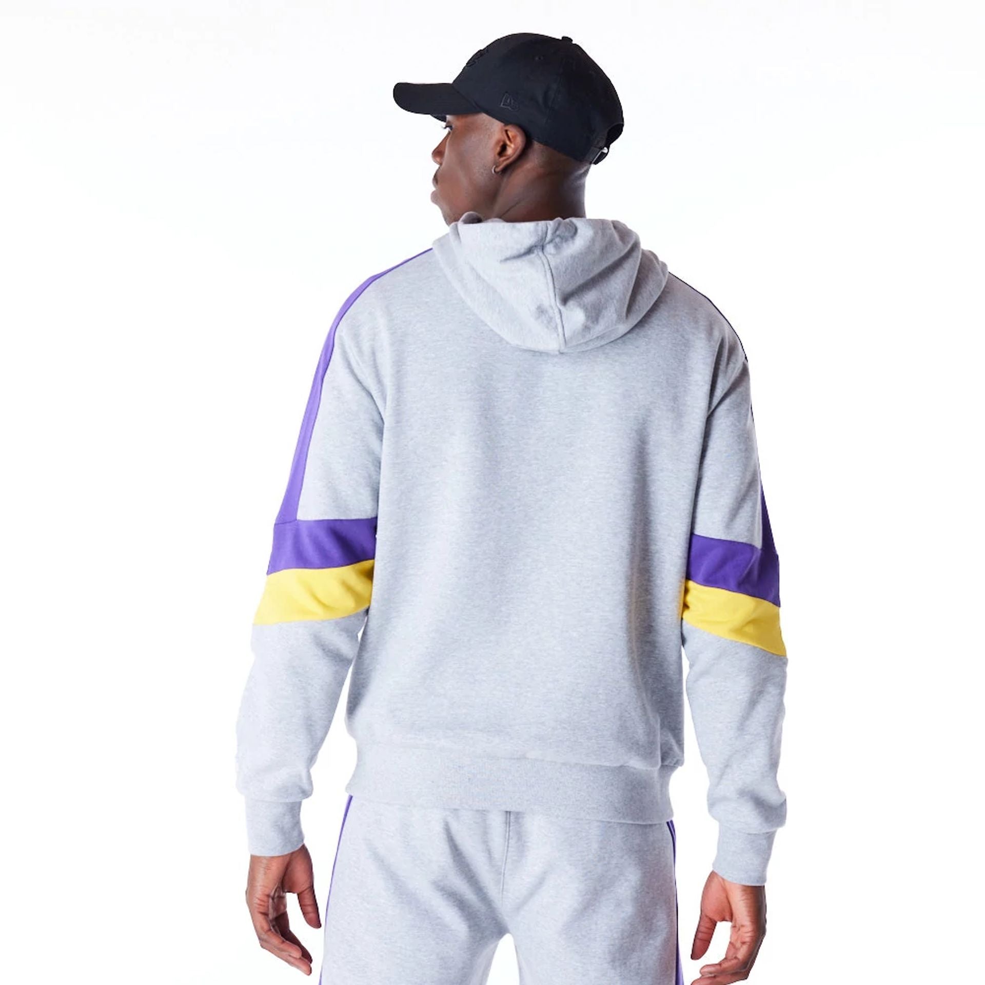 The Male model is wearing LA Lakers Colour Block Grey Pullover Hoodie  3