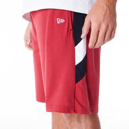 The Male model is wearing Miami Heat NBA Panel Dark Red Oversized Shorts 3