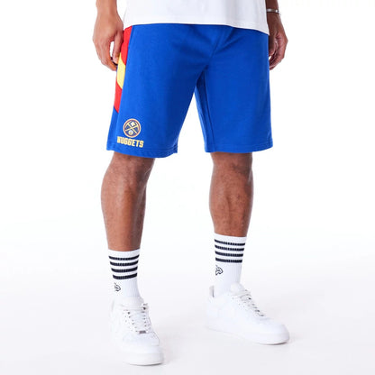 The Male model is wearing Denver Nuggets NBA Panel Blue Oversized Shorts 7