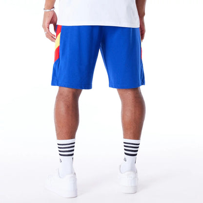 The Male model is wearing Denver Nuggets NBA Panel Blue Oversized Shorts 5