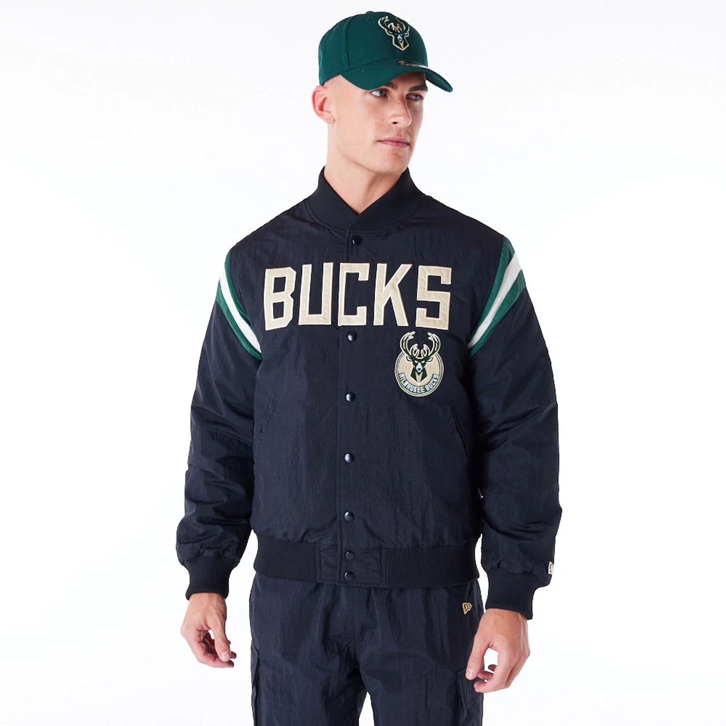 The Male model is wearing Milwaukee Bucks NBA Panel Black Bomber Jacket 1