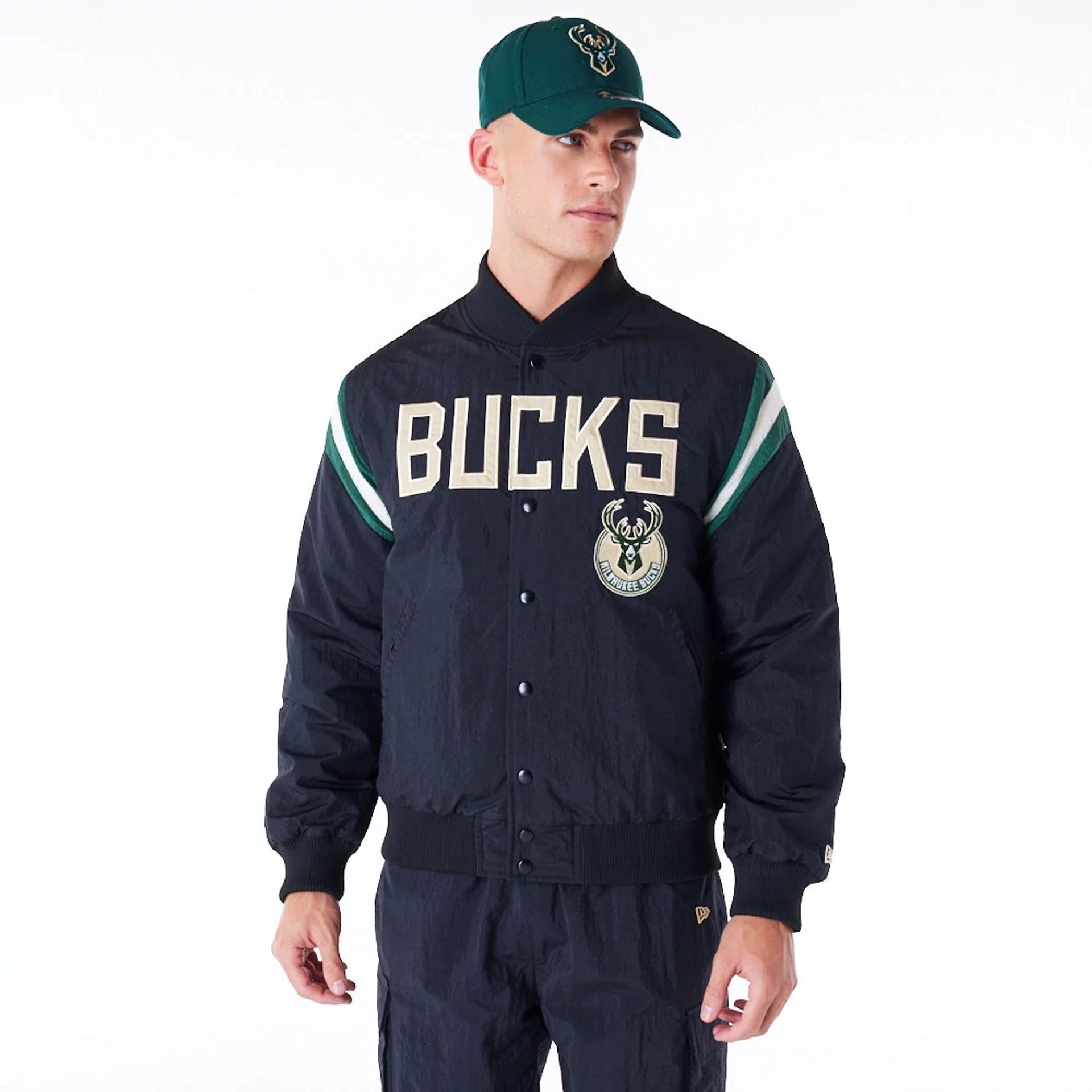 The Male model is wearing Milwaukee Bucks NBA Panel Black Bomber Jacket 1