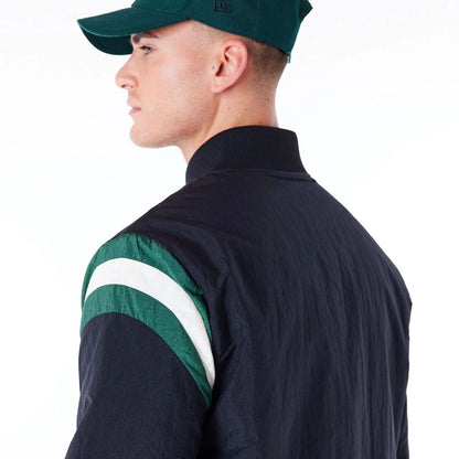 The Male model is wearing Milwaukee Bucks NBA Panel Black Bomber Jacket 4