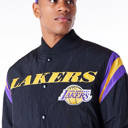 The Male model is wearing LA Lakers NBA Panel Black Bomber Jacket 8