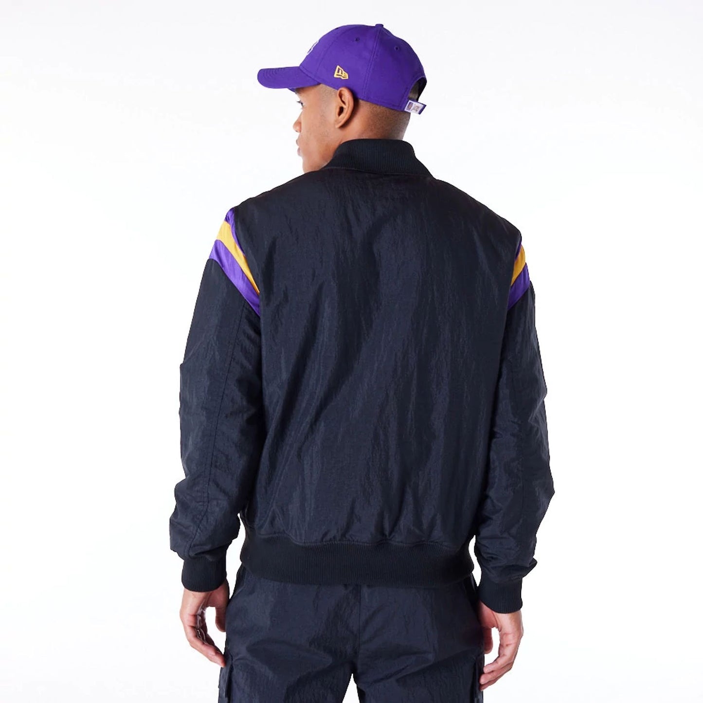 The Male model is wearing LA Lakers NBA Panel Black Bomber Jacket 4