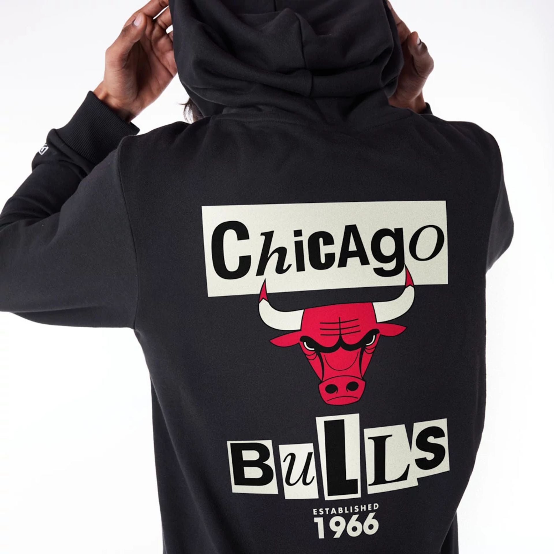 The Male model is wearing Chicago Bulls Newspaper Graphic Black Pullover Hoodie 2