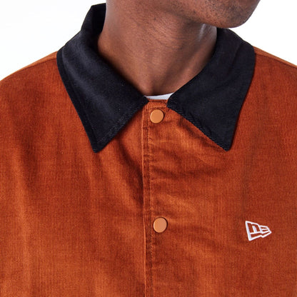 The Male model is wearing New Era Brown Cord Coach Jacket 3